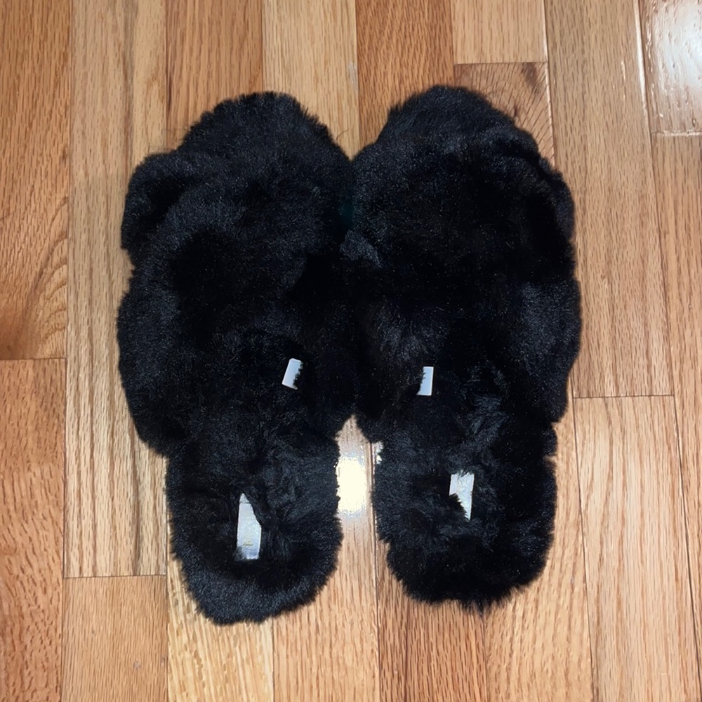 Black fluffy slippers. Worn only a few times!